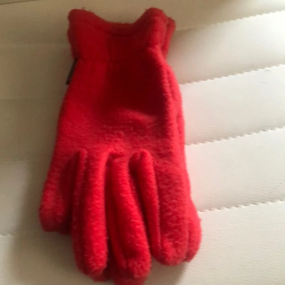 Red fleece gloves by Reebok warm good condition